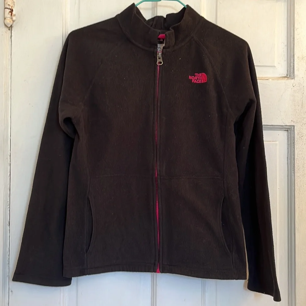 The North Face girls black fleece jacket in size medium 10-12